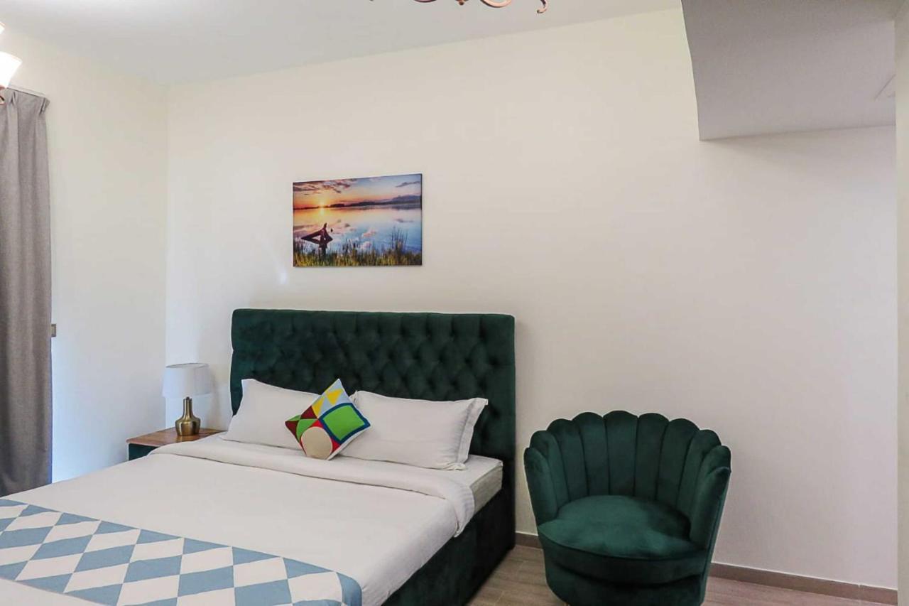 Oyo 860 Studio Apartment, Maya Tower 4, Jumeirah Village Triangle دبي المظهر الخارجي الصورة