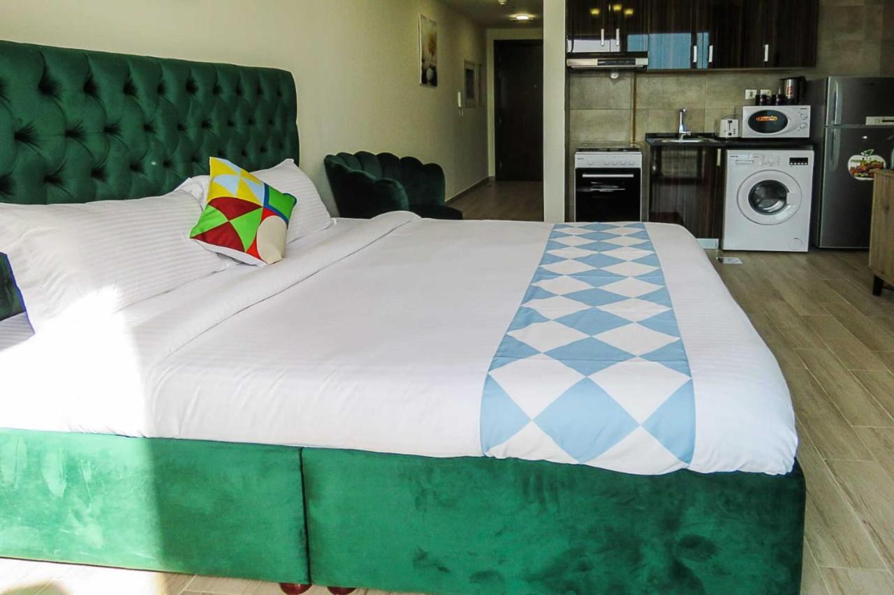 Oyo 860 Studio Apartment, Maya Tower 4, Jumeirah Village Triangle دبي المظهر الخارجي الصورة