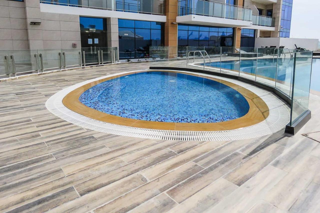 Oyo 860 Studio Apartment, Maya Tower 4, Jumeirah Village Triangle دبي المظهر الخارجي الصورة